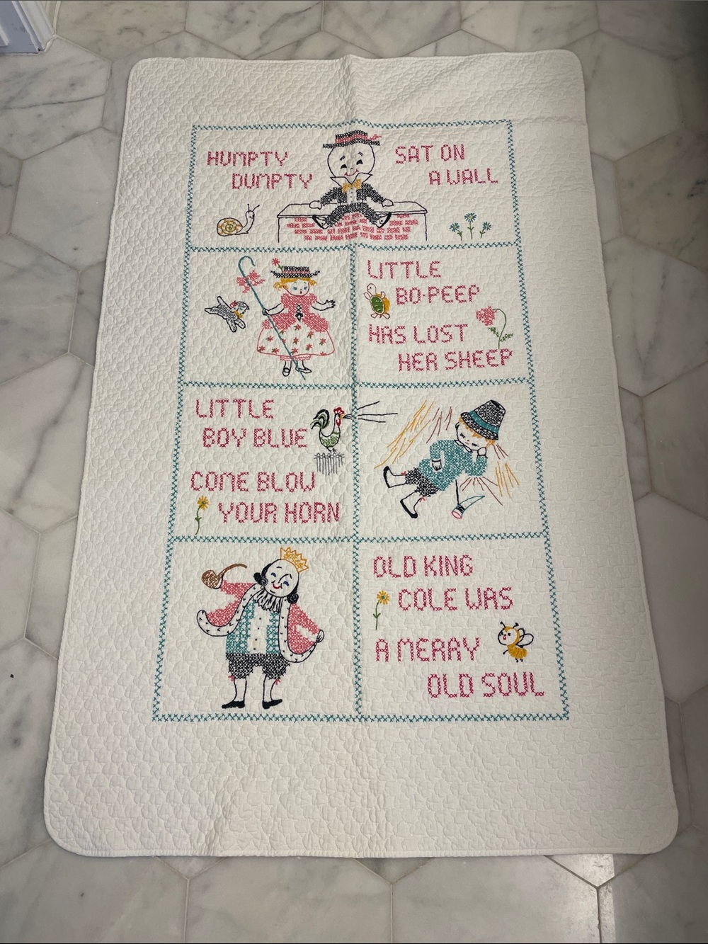 Hand-Embroidered Nursery Quilt - Cream with Pastel Characters